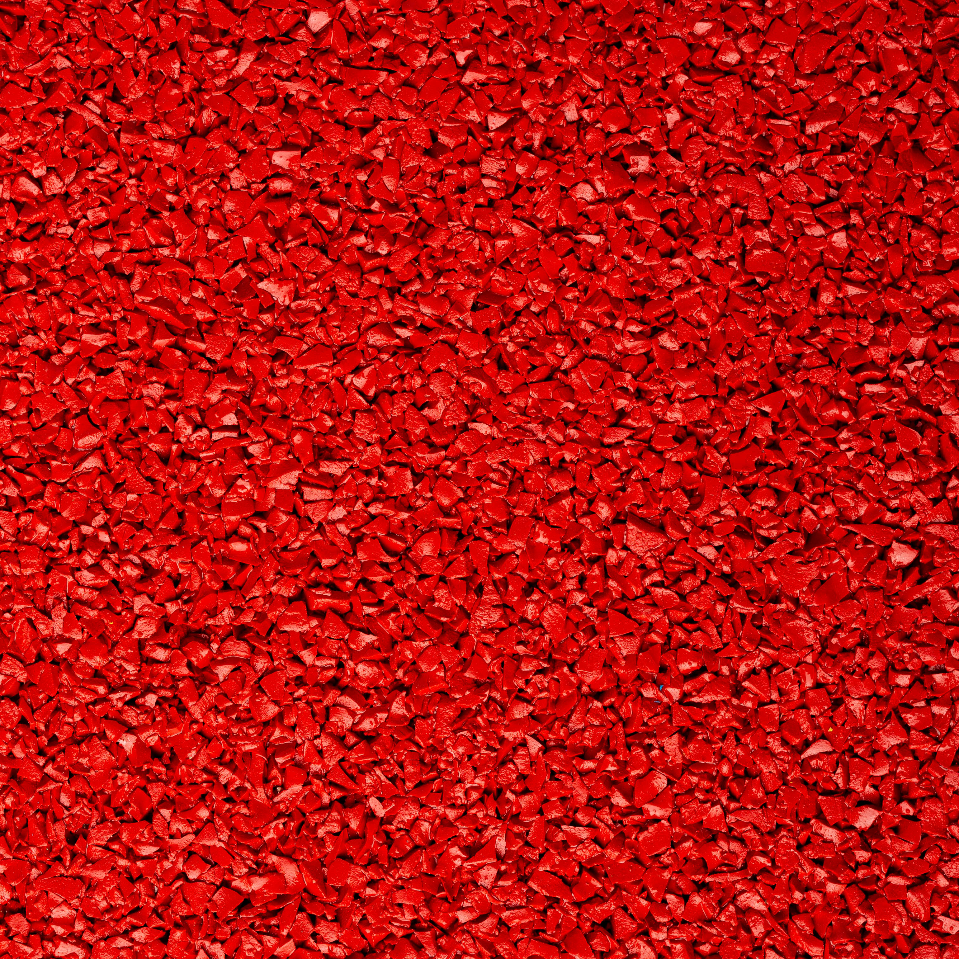 Sistema de color rojo de gr&aacute;nulos de caucho EPDM